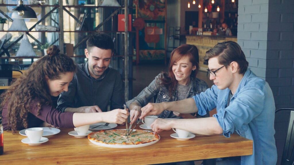 Friends enjoying a meal out together