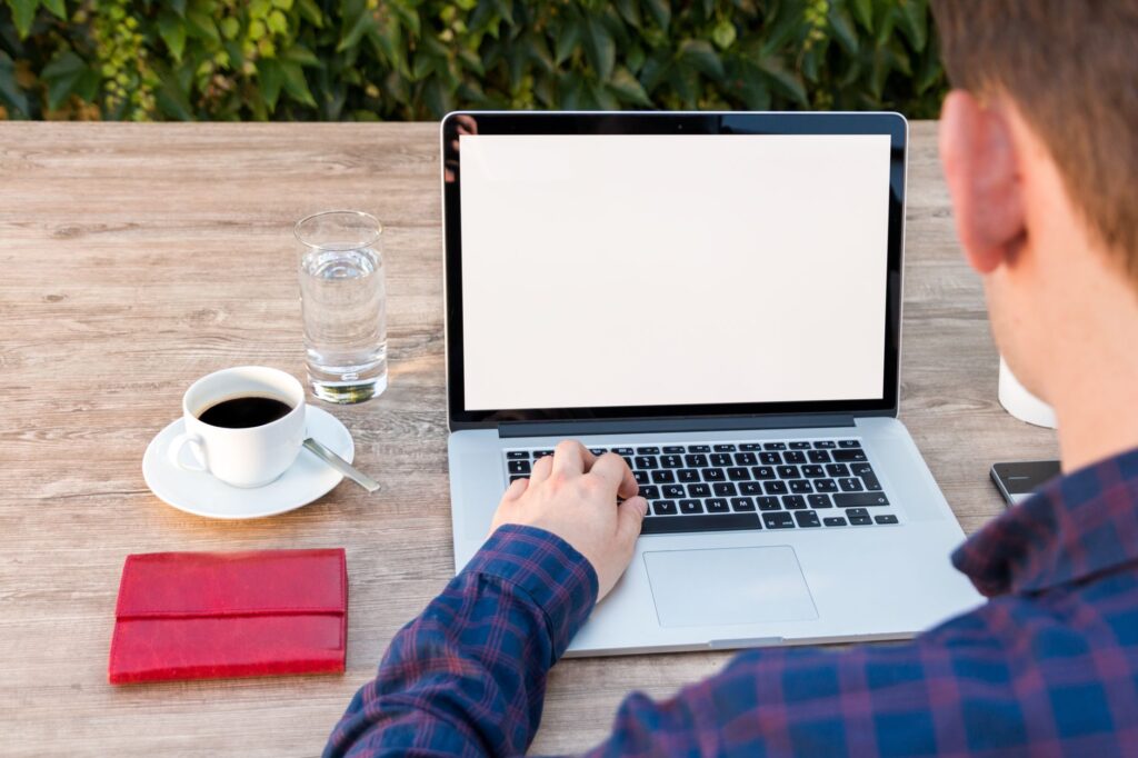 A freelancer working from a home desk