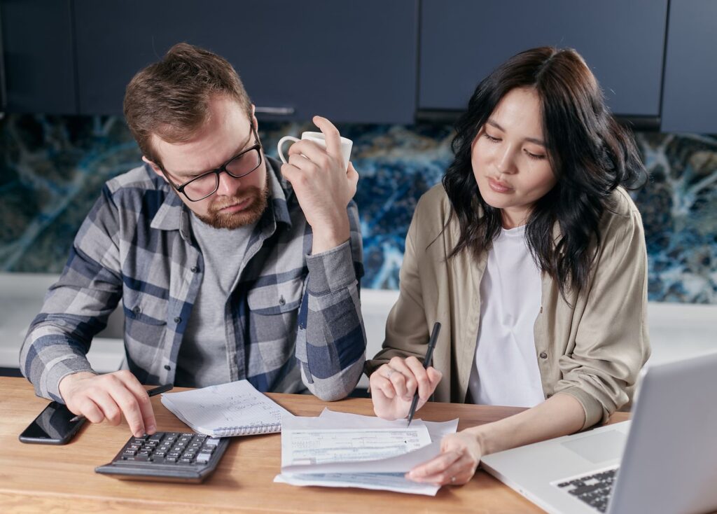 A couple reviewing their finances as a team