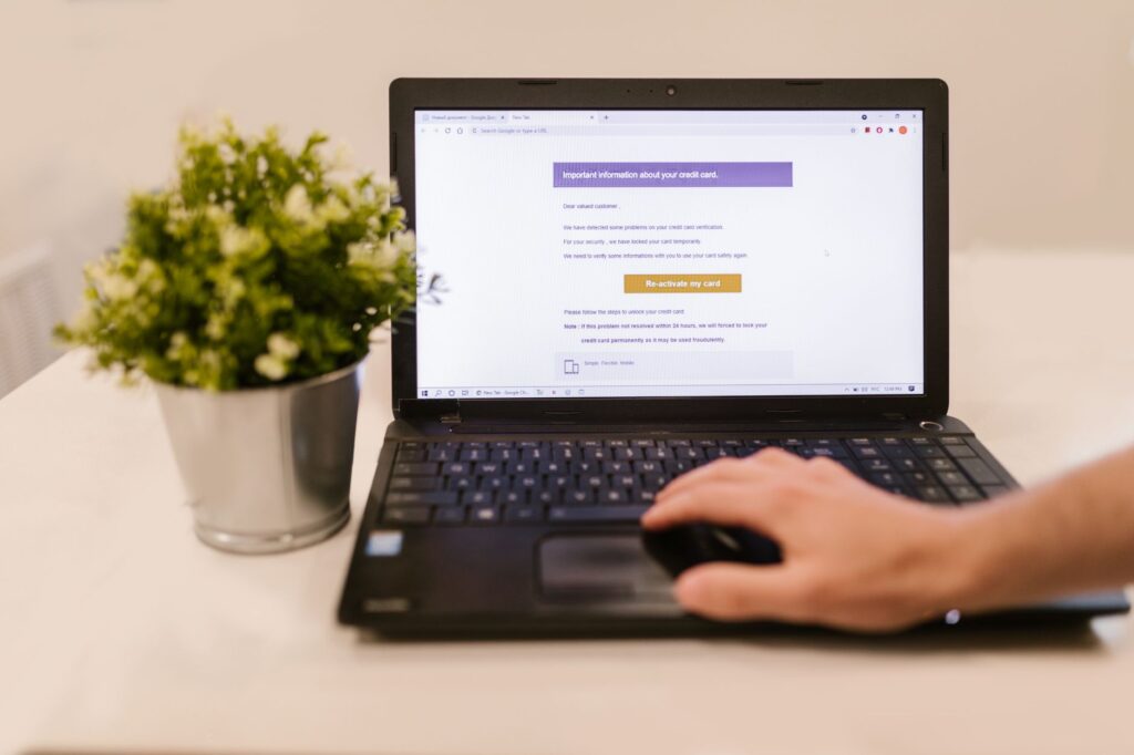 Reviewing a credit report on a laptop