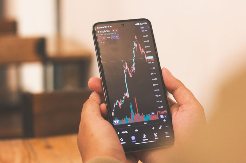 A phone showing an investment growth chart
