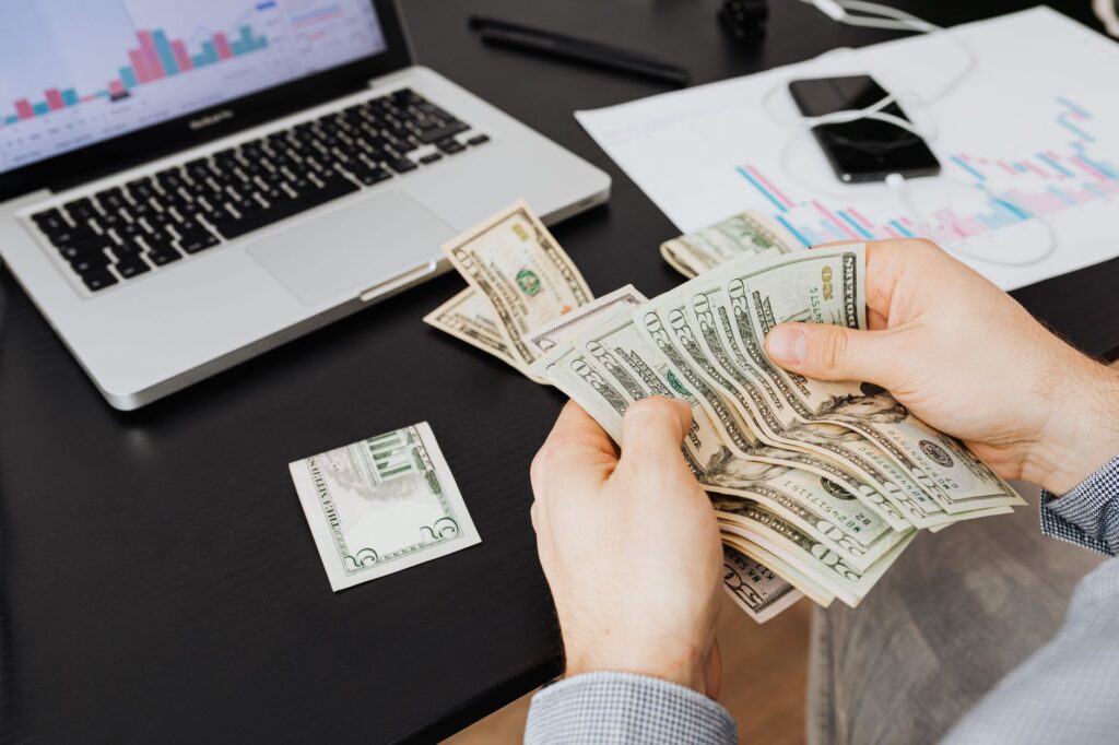 A laptop and coffee representing building passive income