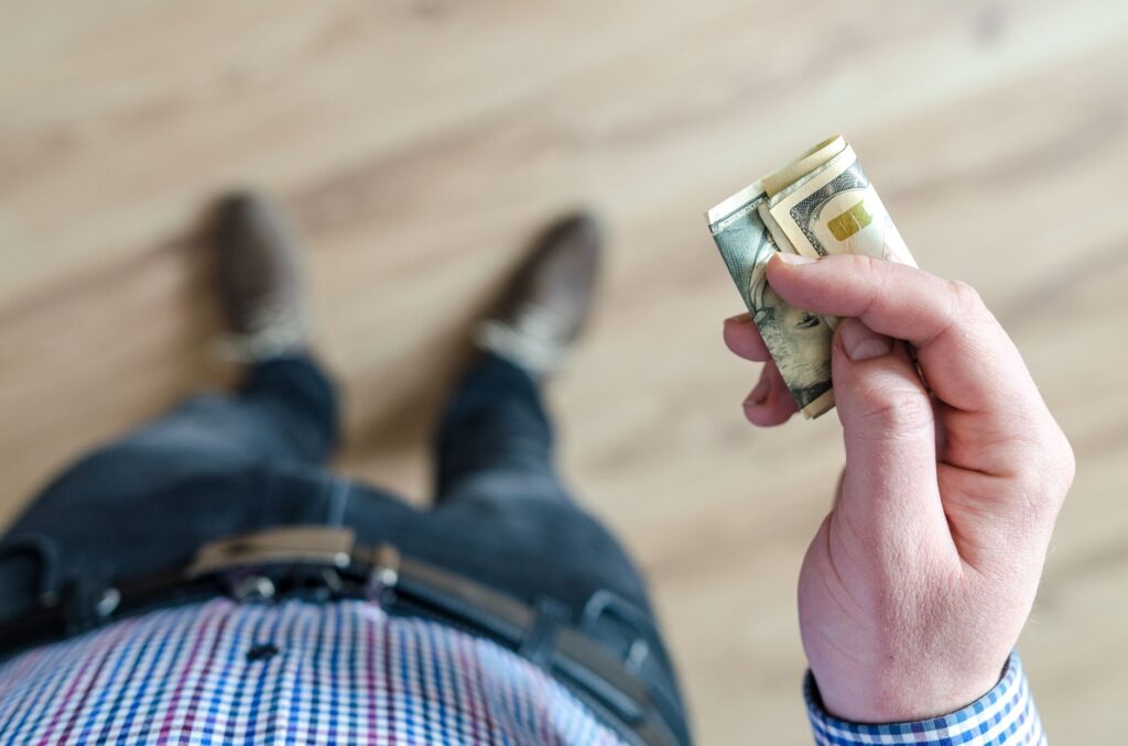 reviewing categorized expenses on a budgeting app