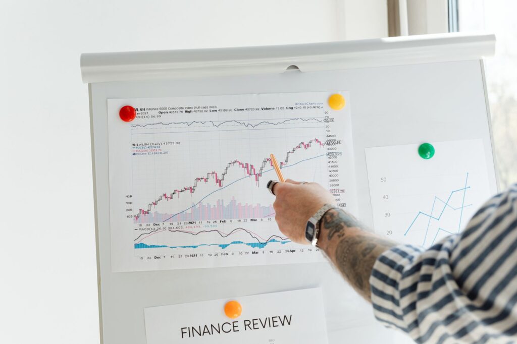 Person calculating retirement savings and investment growth