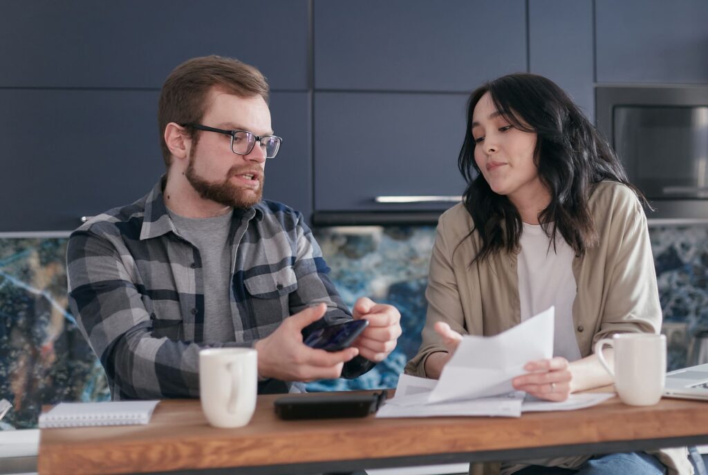 Couple reviewing budget and investment plan together