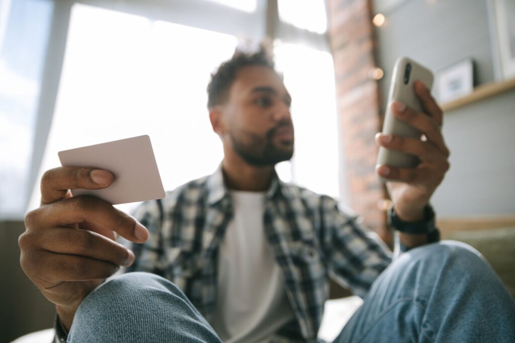 Person setting up an automatic savings transfer on a banking app