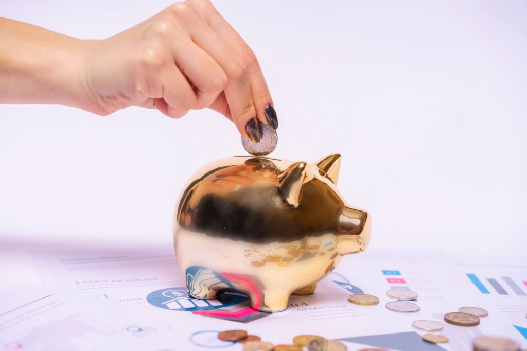 Piggy bank surrounded by coins representing fast savings progress