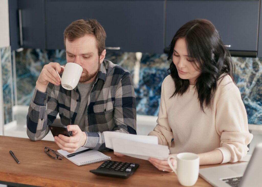 Couple having a calm conversation about household bills