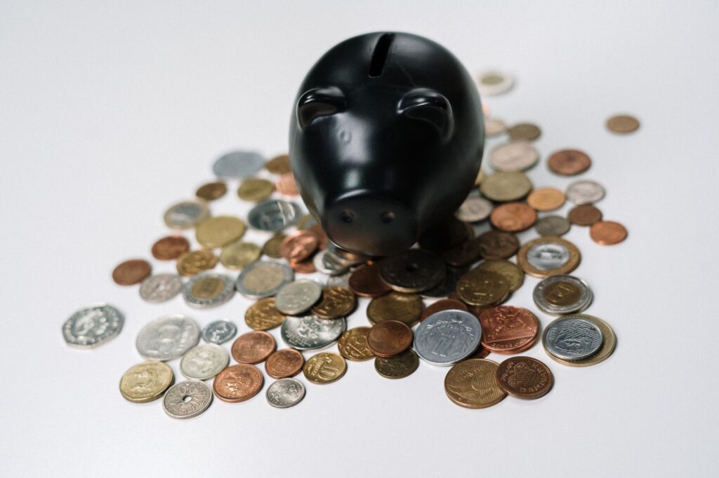 Piggy bank with a small graduation cap symbolizing education savings