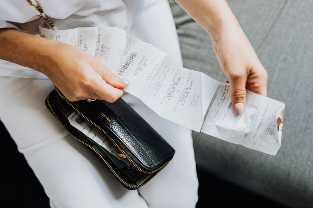 FSA-eligible healthcare receipts and items laid out on a desk