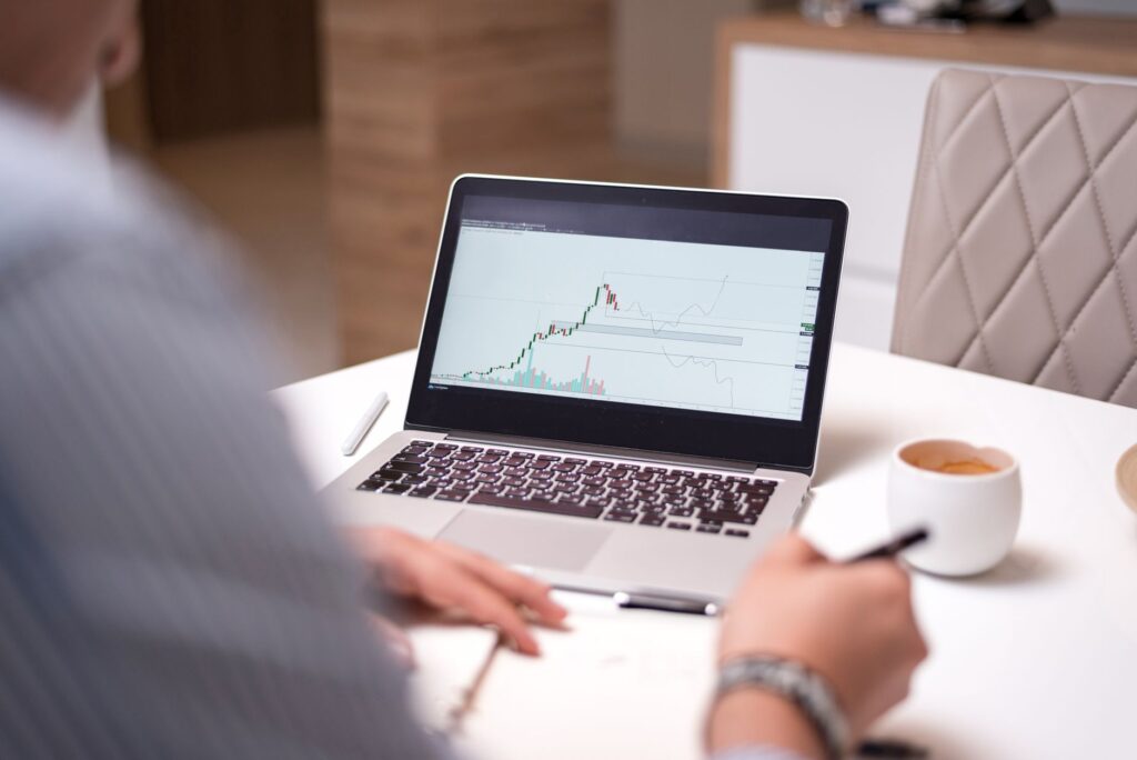 Laptop displaying a stock price chart