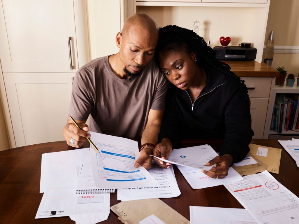 Family reviewing life insurance and financial planning documents